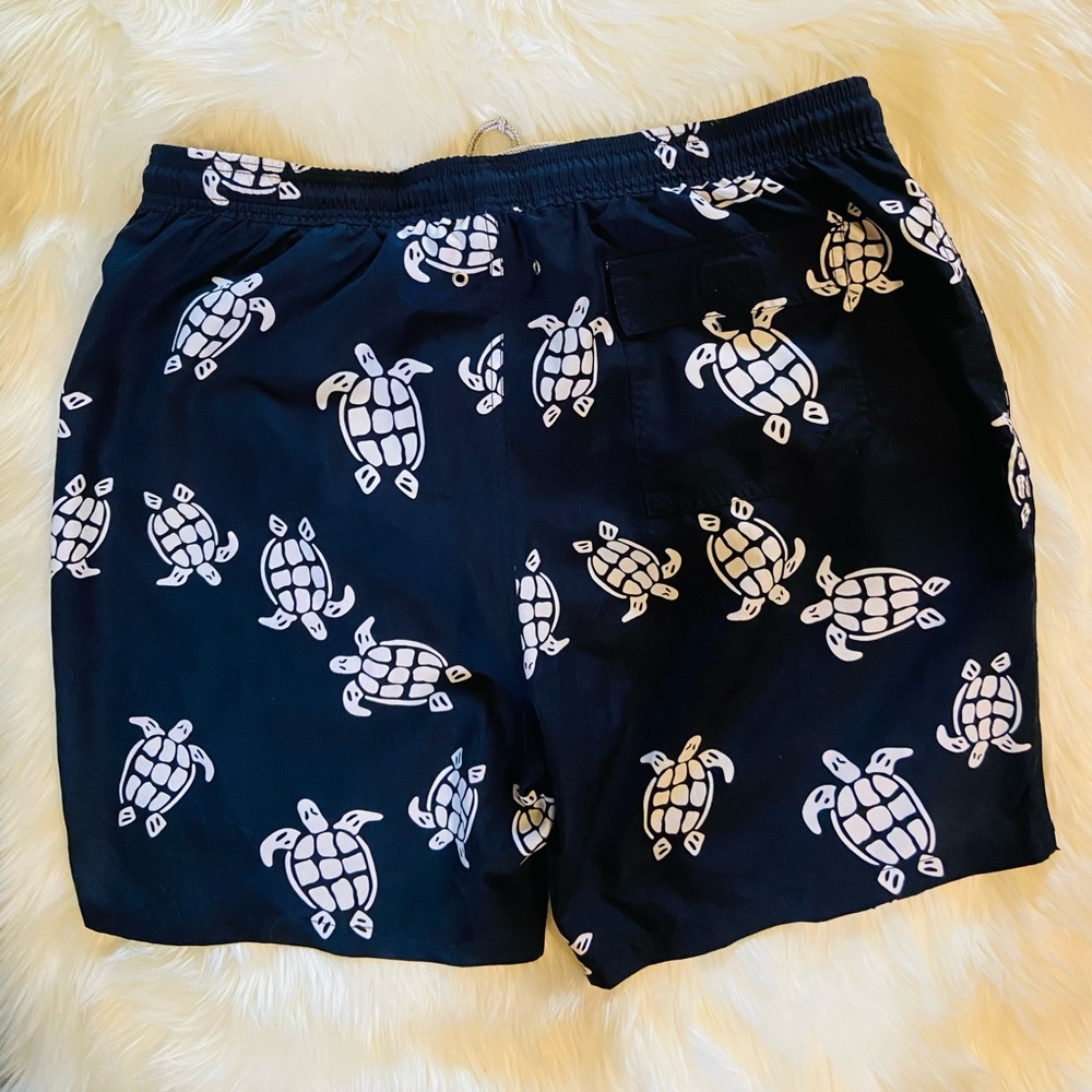 BATHING SUIT WITH TURTLES ON IT. SIZE XL. YOU ARE GOING TO LOVE IT. COMFORTABLE.